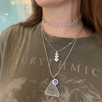 Large Series 5 Black Rhodium Abracadabra layered with timeless Aaron Basha Pieces creating the ultimate layered look.