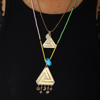 Small Abracadabra Triangle Series 1  paired with Large Series 6 to create a timeless look.