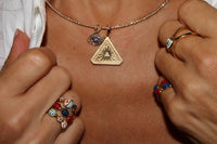 Small Abracadabra Triangle Simple Series 7 with 18K Charm. 