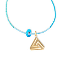 Small Simple Series 1 perfectly paired on India Beaded Eye Necklace