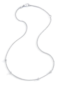 An 18K white gold necklace with four diamond barrels and a length of 18 inches.

