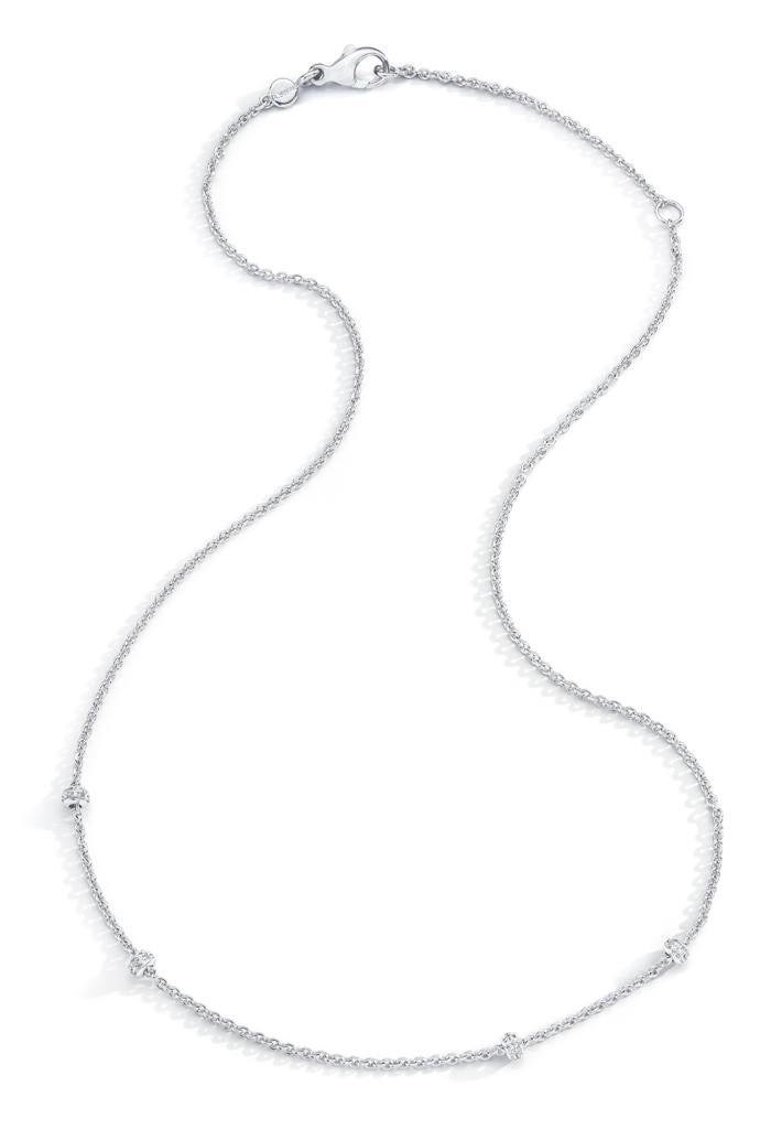 An 18K white gold necklace with four diamond barrels and a length of 18 inches.

