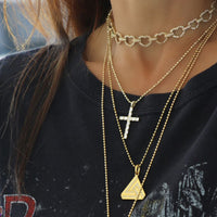 Small Abracadabra Triangle Series 1 Necklace is always perfectly paired with multiple necklace stacks.
