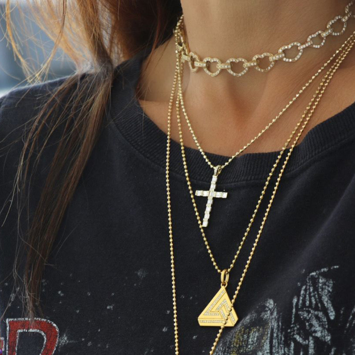 Small Abracadabra Triangle Series 1 Necklace is always perfectly paired with multiple necklace stacks.